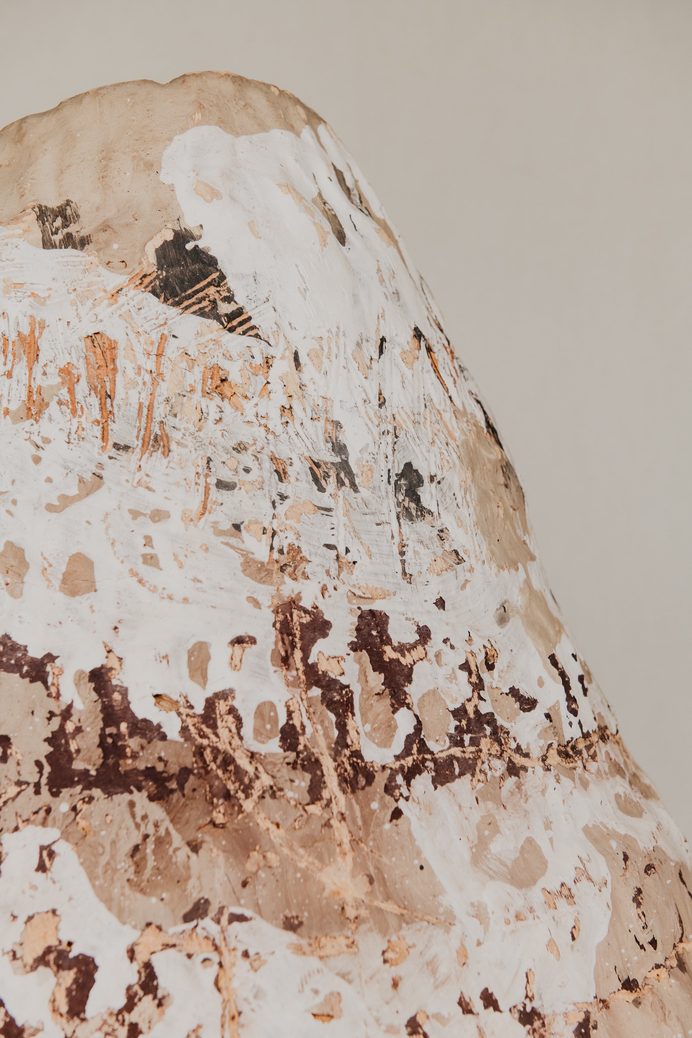 Close-up of a textured surface with brown and white patterns