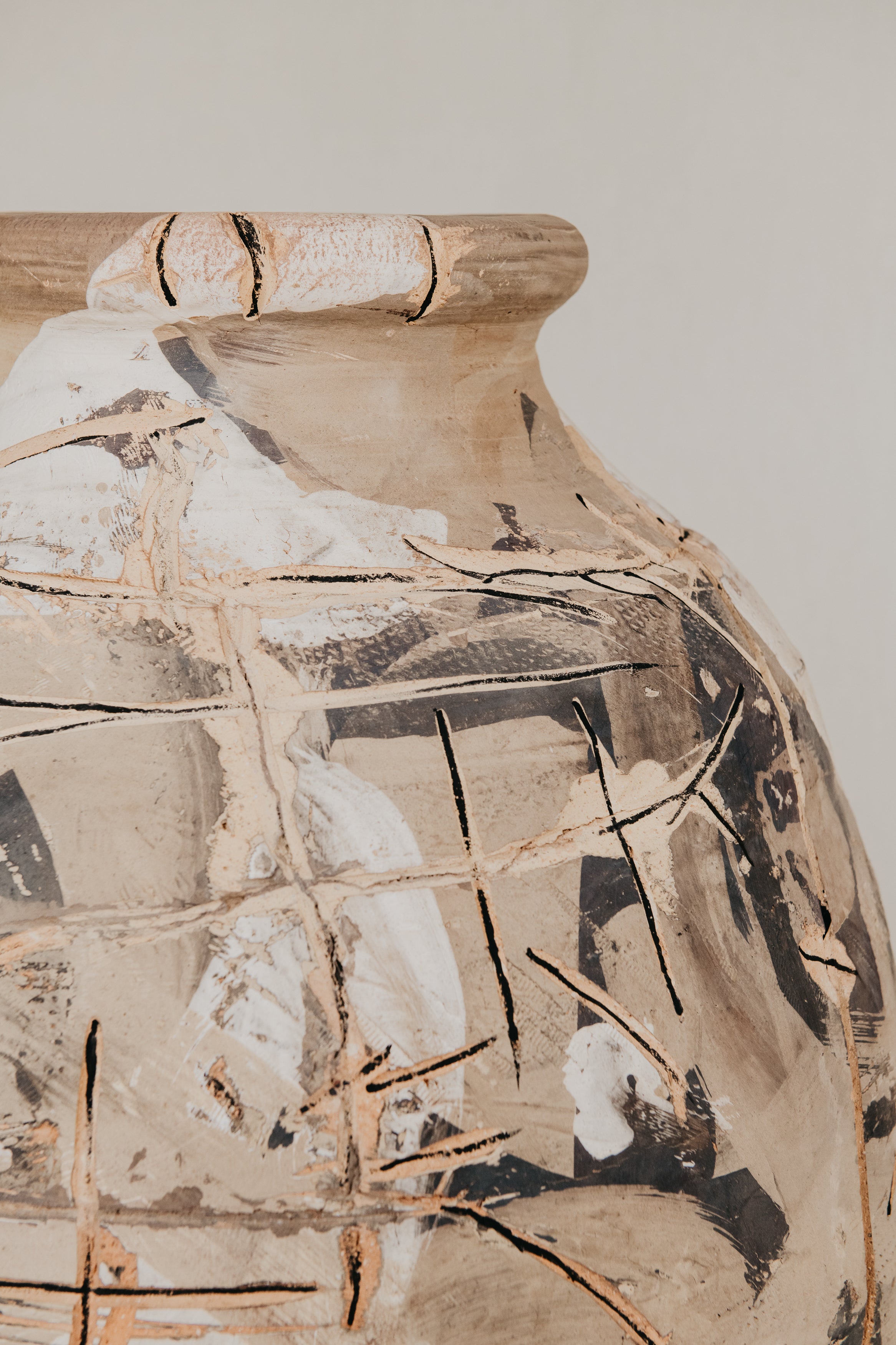 Decorative vase with abstract design on a light background