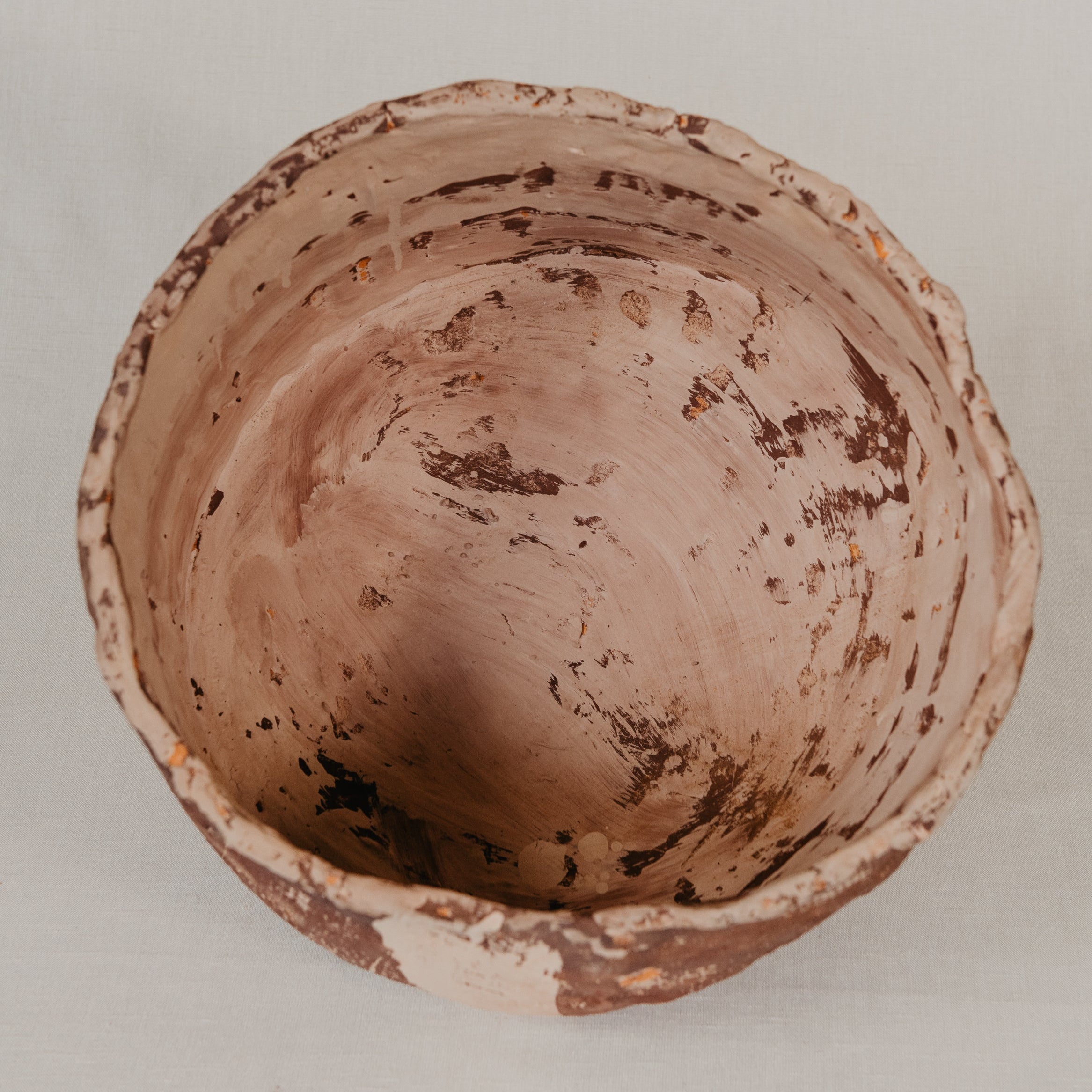 Terracotta pot on a light gray background