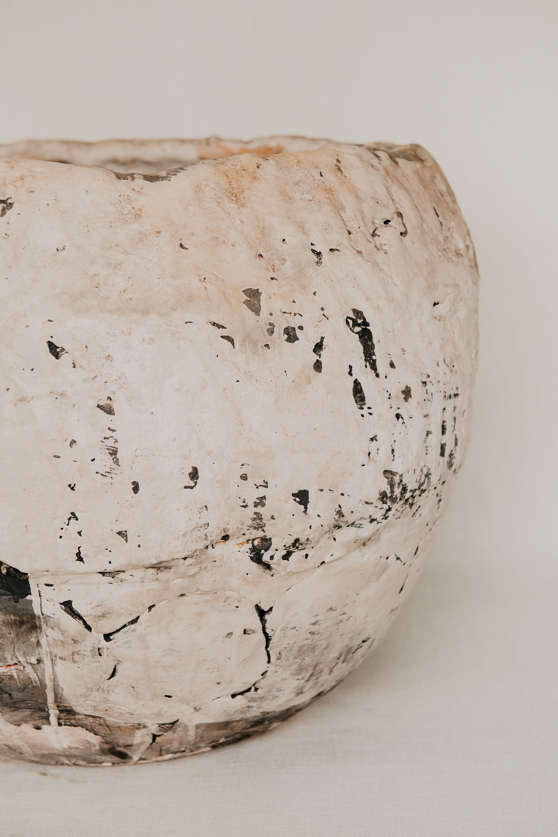 Textured ceramic bowl on a white background